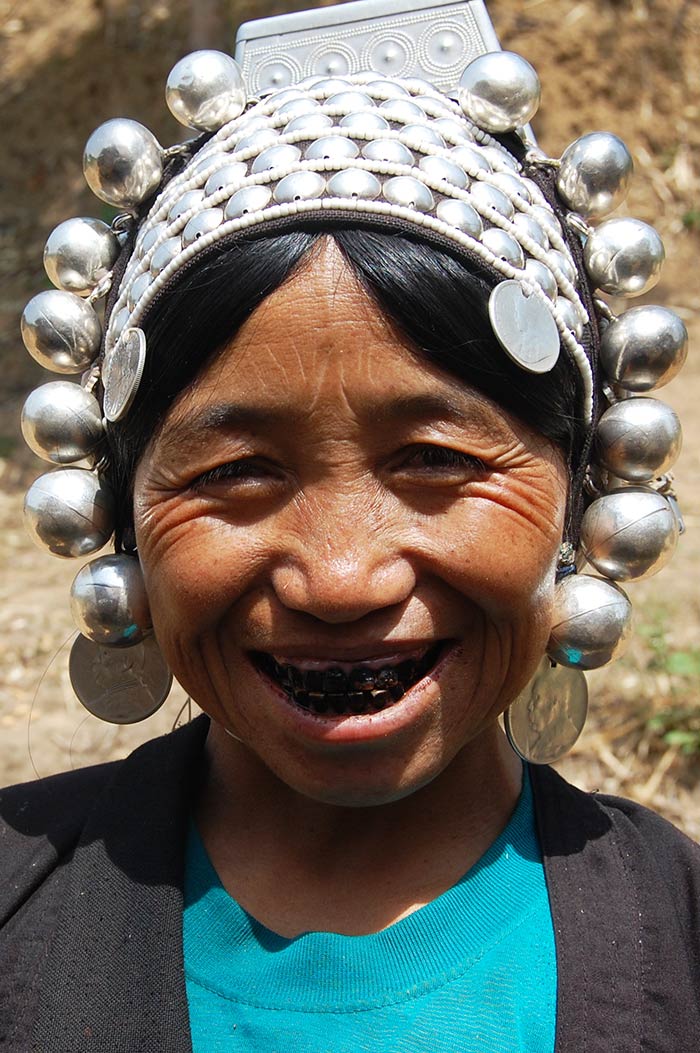 A friendly Akha woman, who was working in her field.