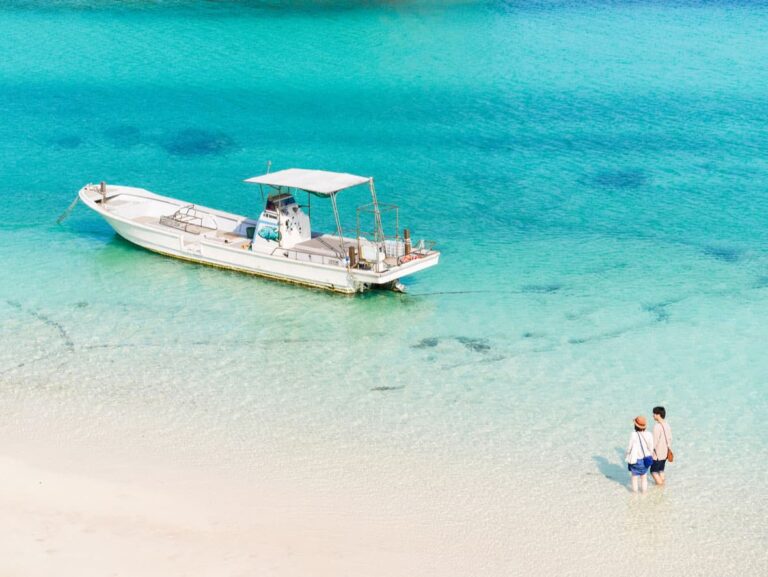 Boat and clear water beach on Ishigaki Island.